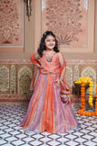Stunning rust orange 4-piece tissue silk lehenga set with embellished crop top, net dupatta and matching potli bag