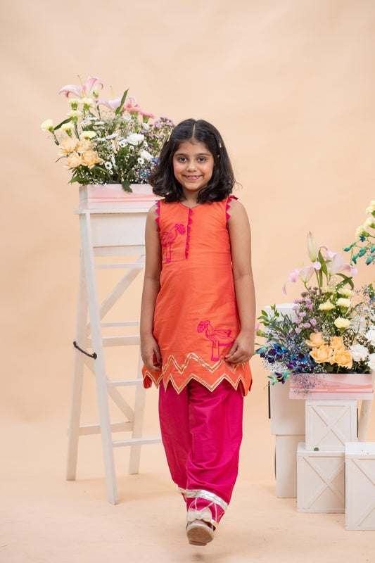 tangerine kurti with rani pink farsi salwar set for girls by Kirti Agarwal