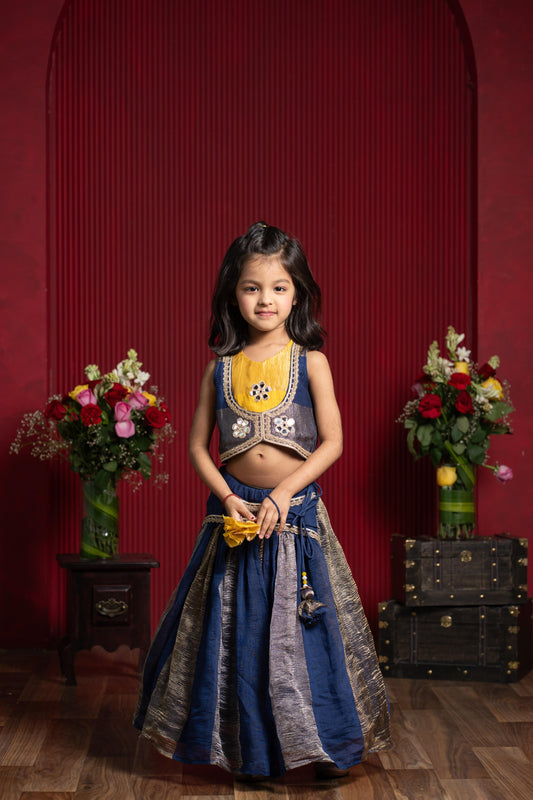 mustard crop top with handworked jacket and navy flared lehenga set for girls by Kirti Agarwal