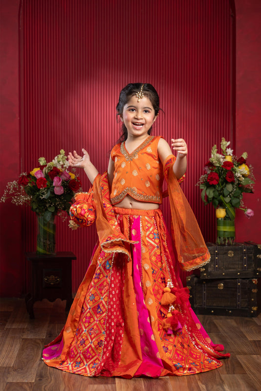 embroidered brocade lehenga set for girls with net dupatta and potli bag by Kirti Agarwal