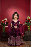 sequin embroidered wine lehenga set for girls with net dupatta by Kirti Agarwal