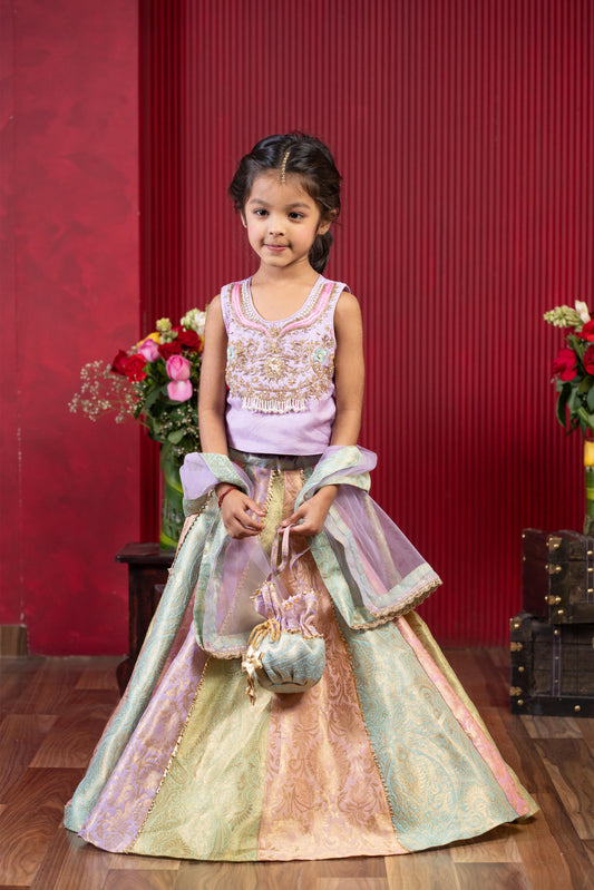 embroidered brocade lehenga set for girls with net dupatta and potli bag by Kirti Agarwal