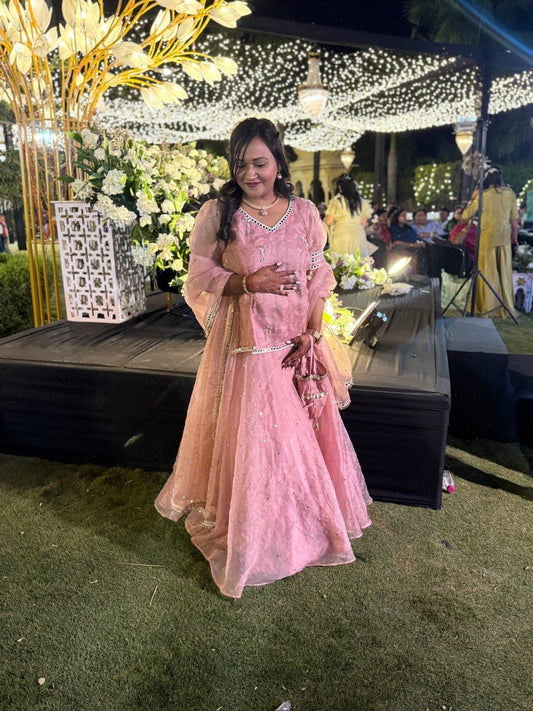 Blush pink embroidered peplum with flared ghagra — a perfect blend of charm and tradition. - Kirti Agarwal