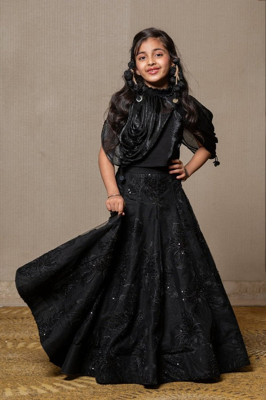 Elegant black gown with intricate floral embroidery and a voluminous Lahenga, perfect for making a timeless statement at any formal event. - Kirti Agarwal