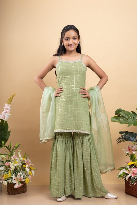 Elegant light Green sleeveless kurti with sequin details, paired with matching sharara pants and a sheer dupatta - Kirti Agarwal