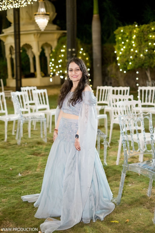 Ice Blue Off - Shoulder Lehenga Set with Layered Net Sleeves - Kirti Agarwal
