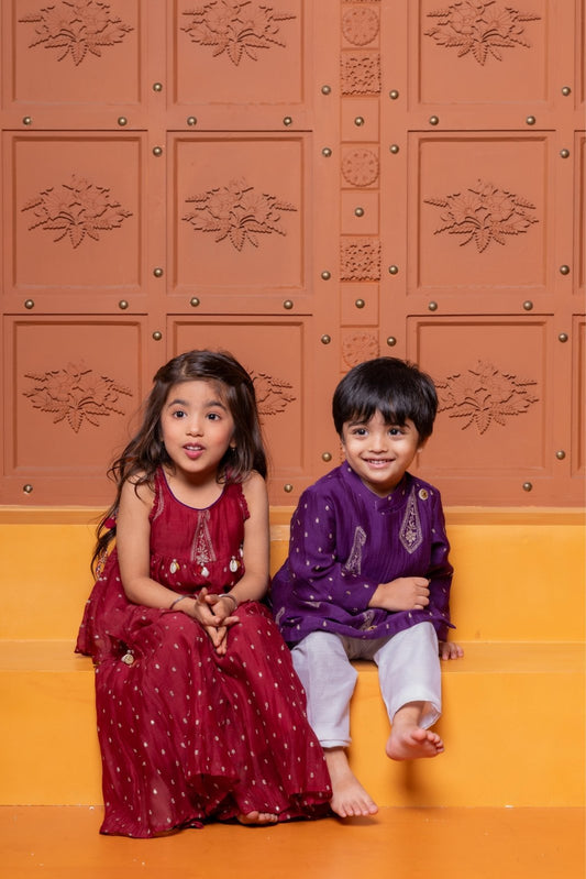 Maroon kid's festive set with embroidered peplum top and flared skirt & Purple Embroidered Flap Kurta With White Pyjama - Kirti Agarwal