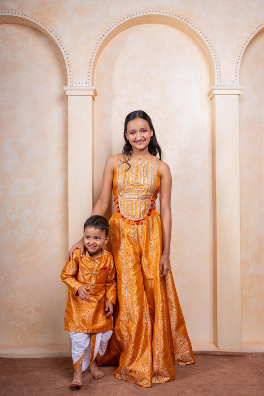 Royal golden silk kurta with traditional dhoti & Girls Golden - Orange Brocade Crop Top with Embroidered Palazzo Pants - Kirti Agarwal