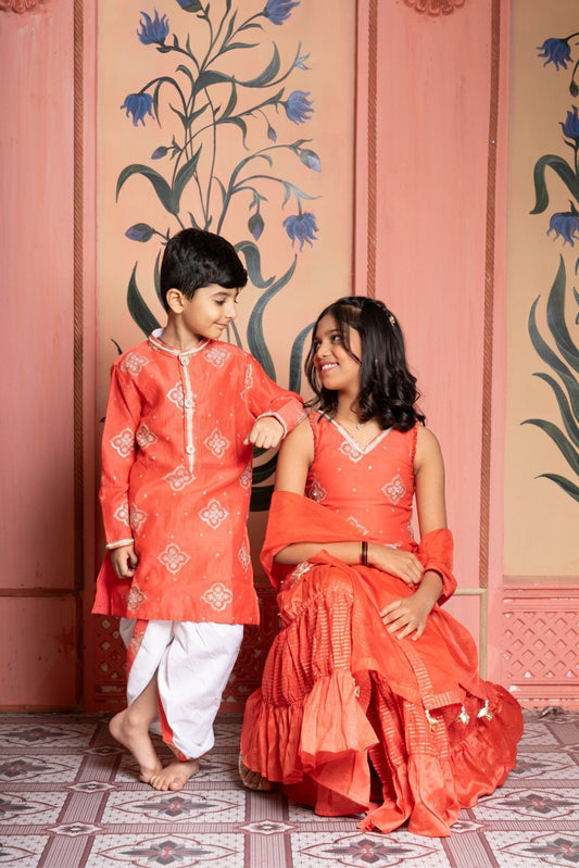 Rust - orange embroidered kurta & embroidered sharara set with gota detailing and tassel dupatta. - Kirti Agarwal