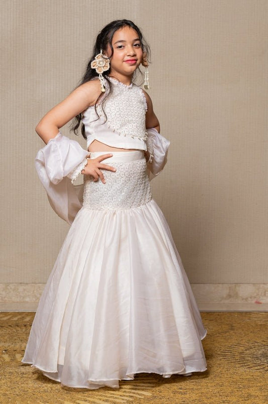Stunning off - white gown with intricate beadwork and a flowing silhouette, perfect for making a graceful statement at any formal event. - Kirti Agarwal