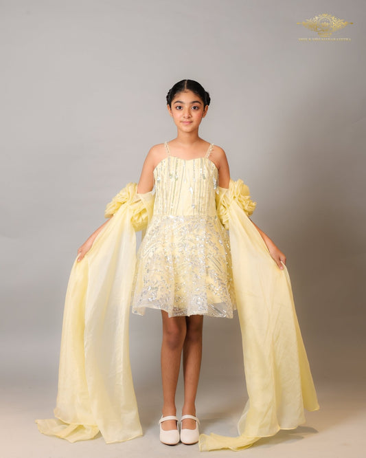 Sunshine Sparkle – A Dazzling Yellow Frock with Flowing Drapes for the Little Diva. - Kirti Agarwal