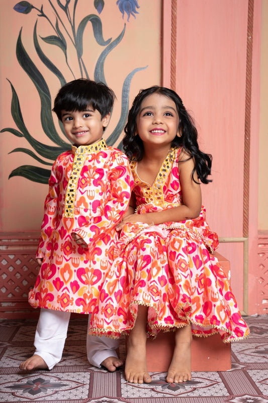 Vibrant printed kurti - sharara set and Vibrant printed kurta paired with classic white pyjama - Kirti Agarwal