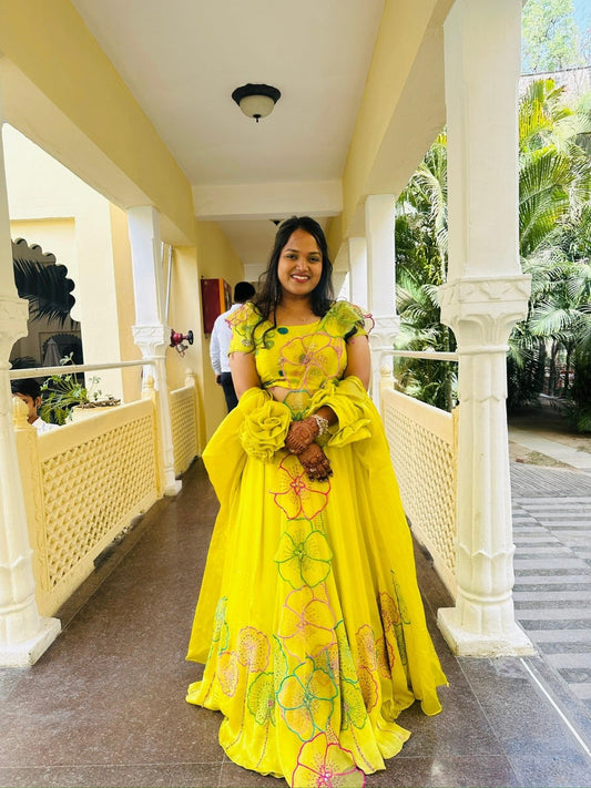 Vibrant Yellow Floral Crop Top Lehenga with Dramatic Sleeves - Kirti Agarwal