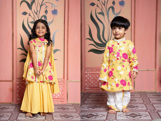 Yellow floral kurta with pre - stitched dhoti & floral peplum set with flared Palazzo and tassel dupatta - Kirti Agarwal