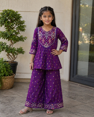 Elegant purple silk kurta palazzo set with intricate embroidery and beautiful embroidered animal motifs on the sleeves