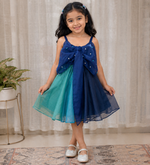 Elegant Blue Organza Frock with a Statement Bow and Delicate Embellishments.