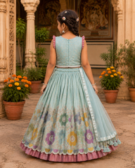 Gorgeous V Neck Top And Shimmery Lehenga With Matching Net Dupatta