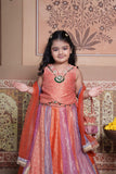 Stunning rust orange 4-piece tissue silk lehenga set with embellished crop top, net dupatta and matching potli bag