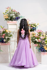 Elegant Embroidered Halter Top With Flowing Layered Lehenga And Statement Floral Latkan Detail