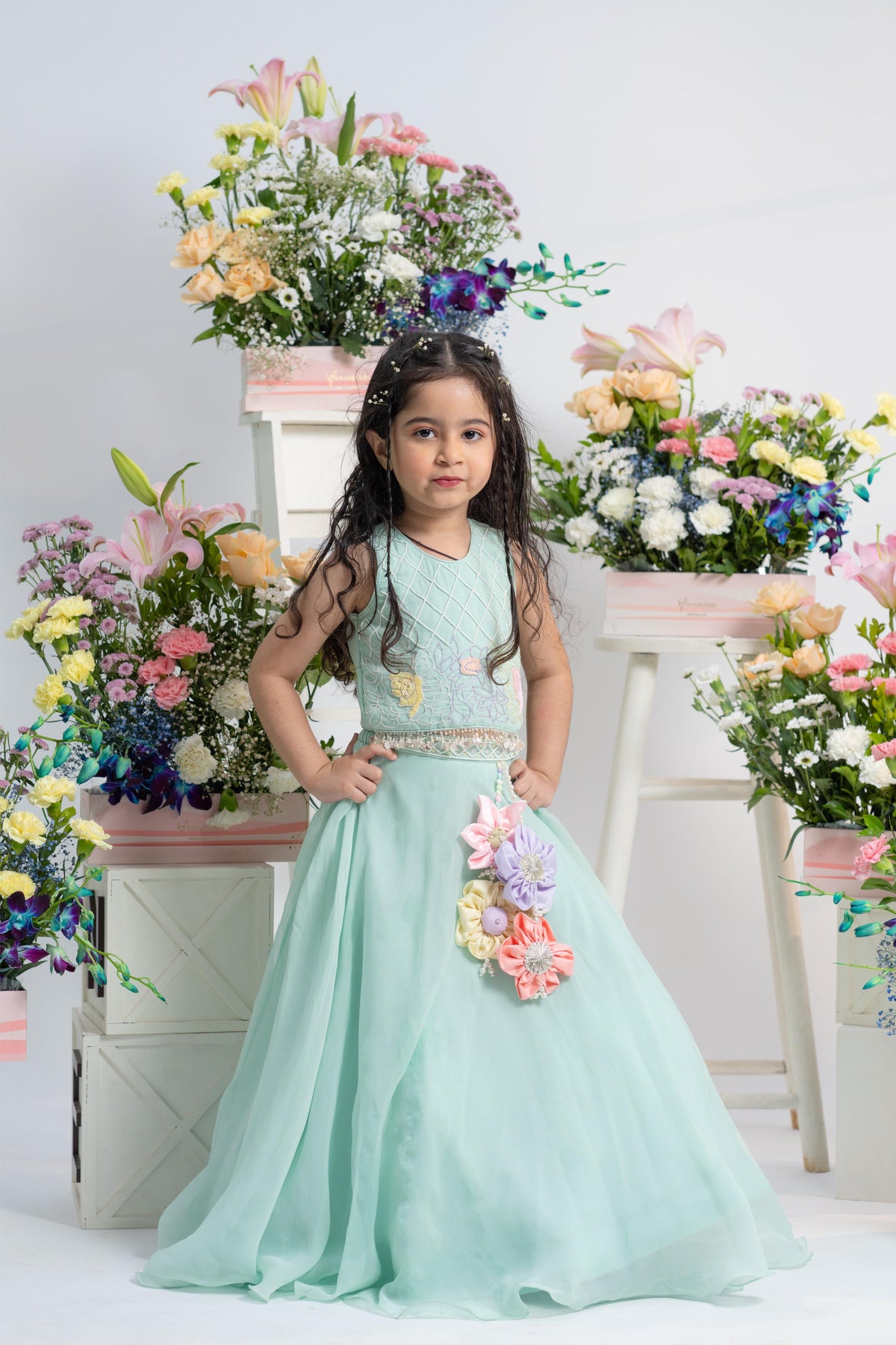 Chic Mint Embroidered Top With Flowing Lehenga And Statement Floral Latkan Detail