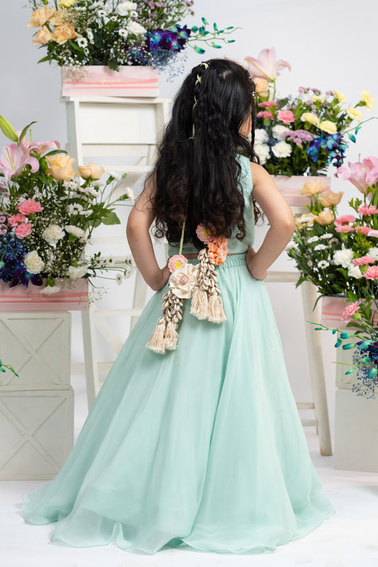 Designer mint green girls lehenga outfit with floral latkan