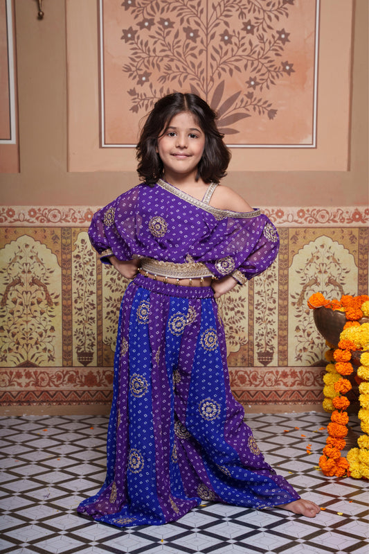 Elegant blue and purple Bandhini-print Georgette set featuring a stylish one-shoulder top with statement sleeves and a flowy Palazzo