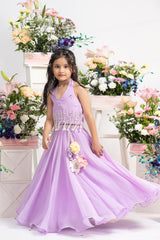 Elegant Embroidered Halter Top With Flowing Layered Lehenga And Statement Floral Latkan Detail