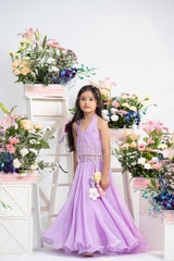 Elegant Embroidered Halter Top With Flowing Layered Lehenga And Statement Floral Latkan Detail