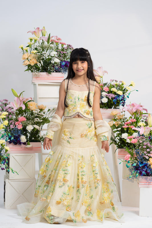 Floral yellow lehenga set for girls with sheer net blouse and organza dupatta