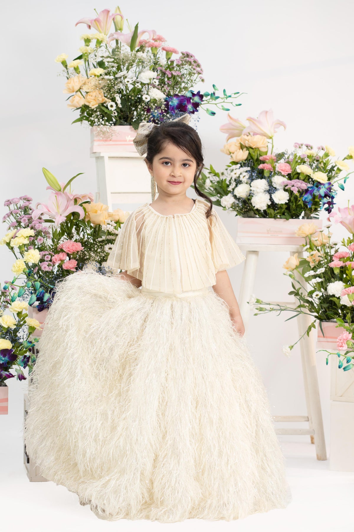 Luxury Pleated Shimmer Top With Dramatic Feathered Skirt In Elegant Ivory Couture Style