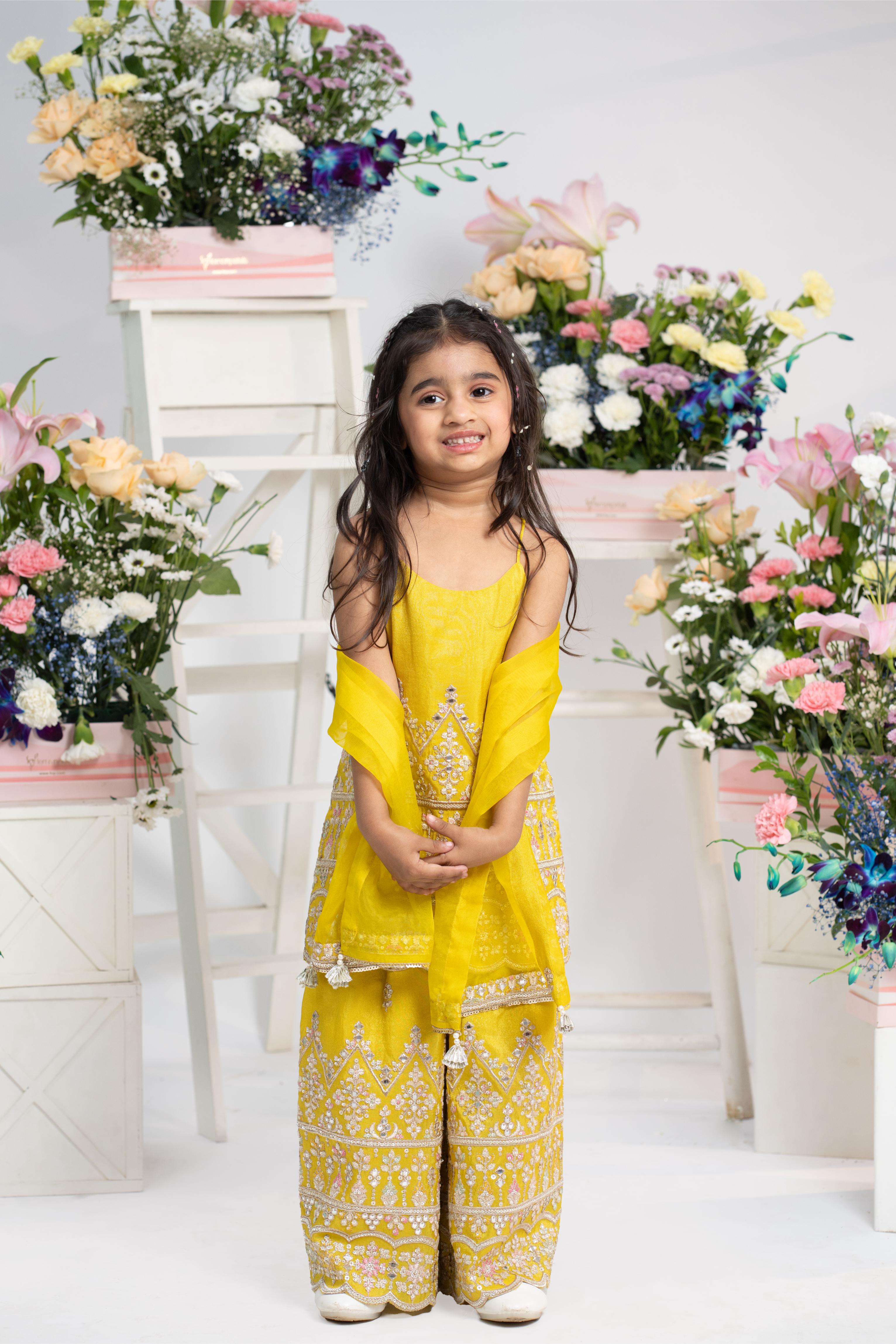 Bright yellow embroidered sharara set for girls with silver zari work