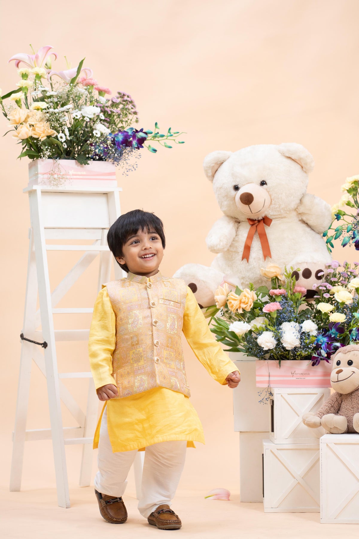 sunshine yellow kurta set with gold nehru jacket for boys by Kirti Agarwal