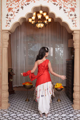 Red Embroidered One-Shoulder Dhoti Set with Handcrafted Tassel Detailing