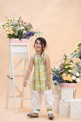 designer pistachio green kurti with white pants festive outfit for girls