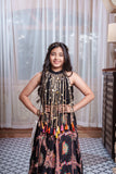 Black Embroidered Crepe Lehenga Set with Statement Pearl Tassel Top.