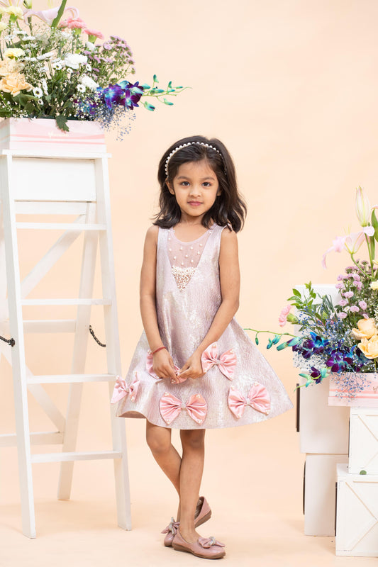 blush pink bow party dress for girls by Kirti Agarwal