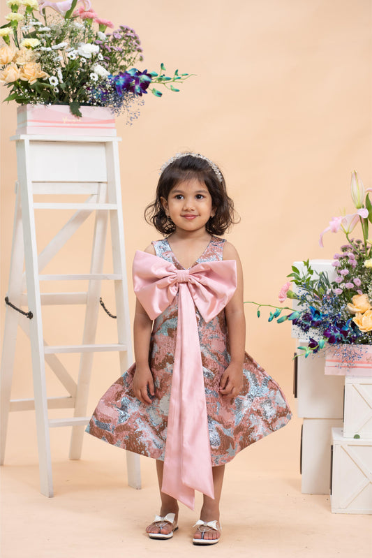 blush jacquard party dress for girls with satin bow by Kirti Agarwal