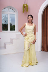Pastel Yellow Floral Embroidered Asymmetric Top With Flared Palazzo & Tassel Detailing