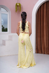 Pastel Yellow Floral Embroidered Asymmetric Top With Flared Palazzo & Tassel Detailing