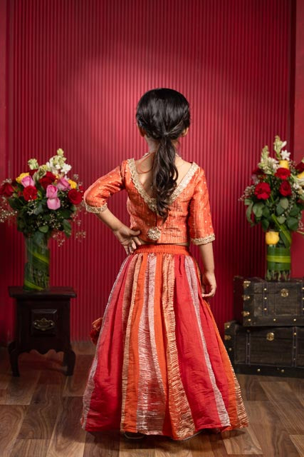 kids orange panelled flared lehenga with contrast yoke choli