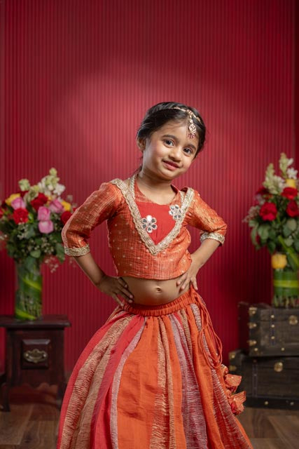 designer orange choli lehenga outfit for girls festive wear