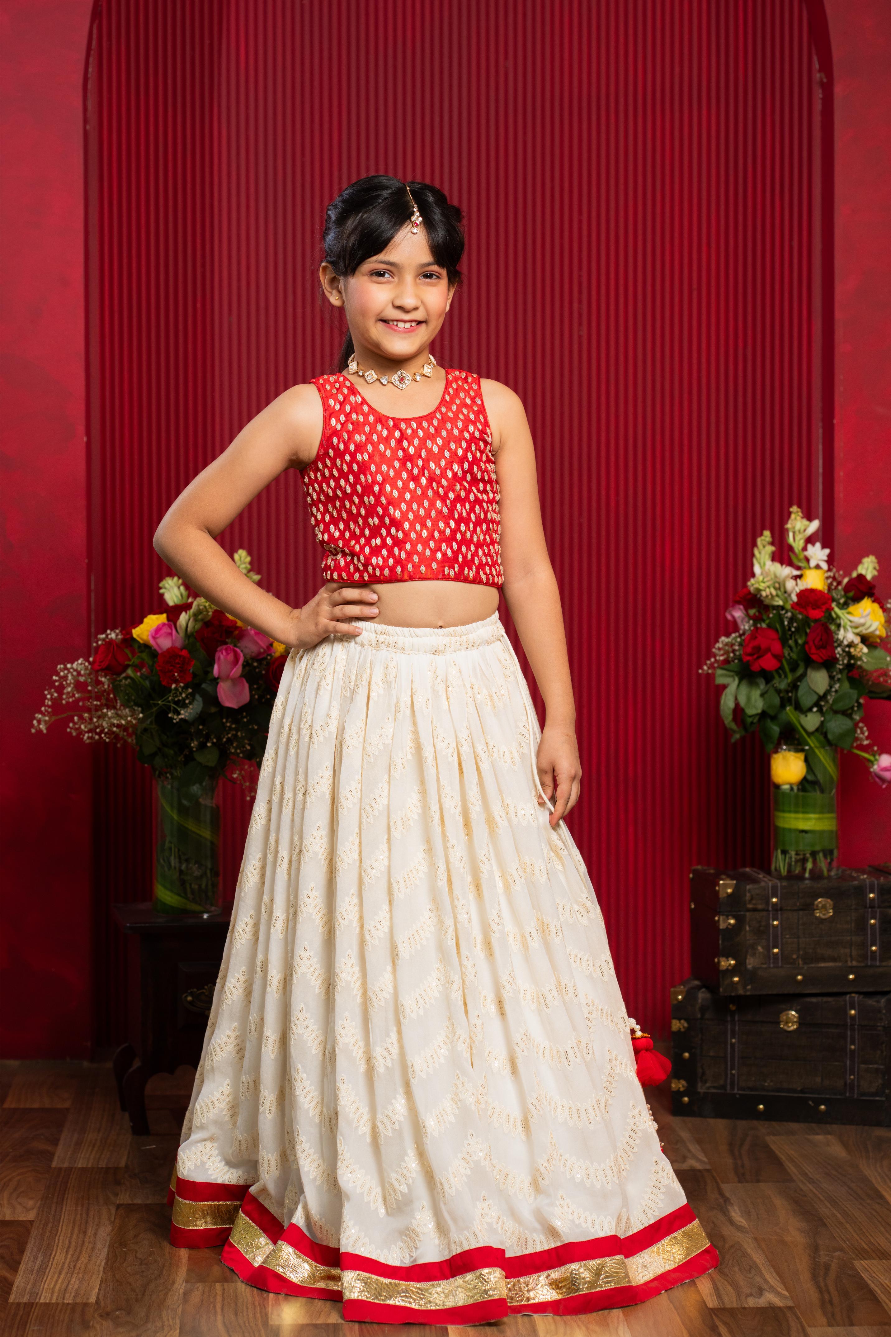 red and ivory festive lehenga set for girls by Kirti Agarwal