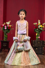 Intricate Embroidered Top And Brocade Lehenga With Matching Net Dupatta And Brocade Potli Bag