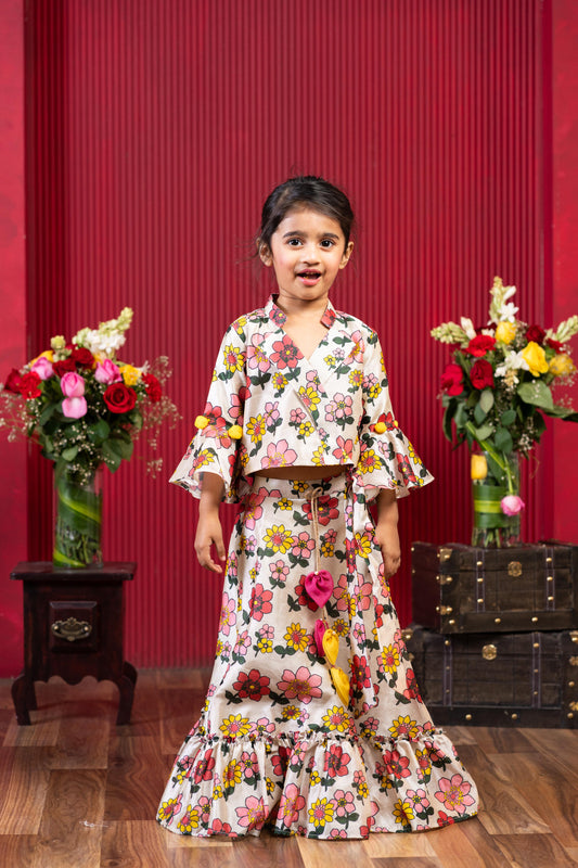 beige floral wrap crop top with printed flared skirt set for girls by Kirti Agarwal