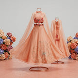 Peach Embroidered Chanderi Silk Lehenga Set with Attached Organza Cape