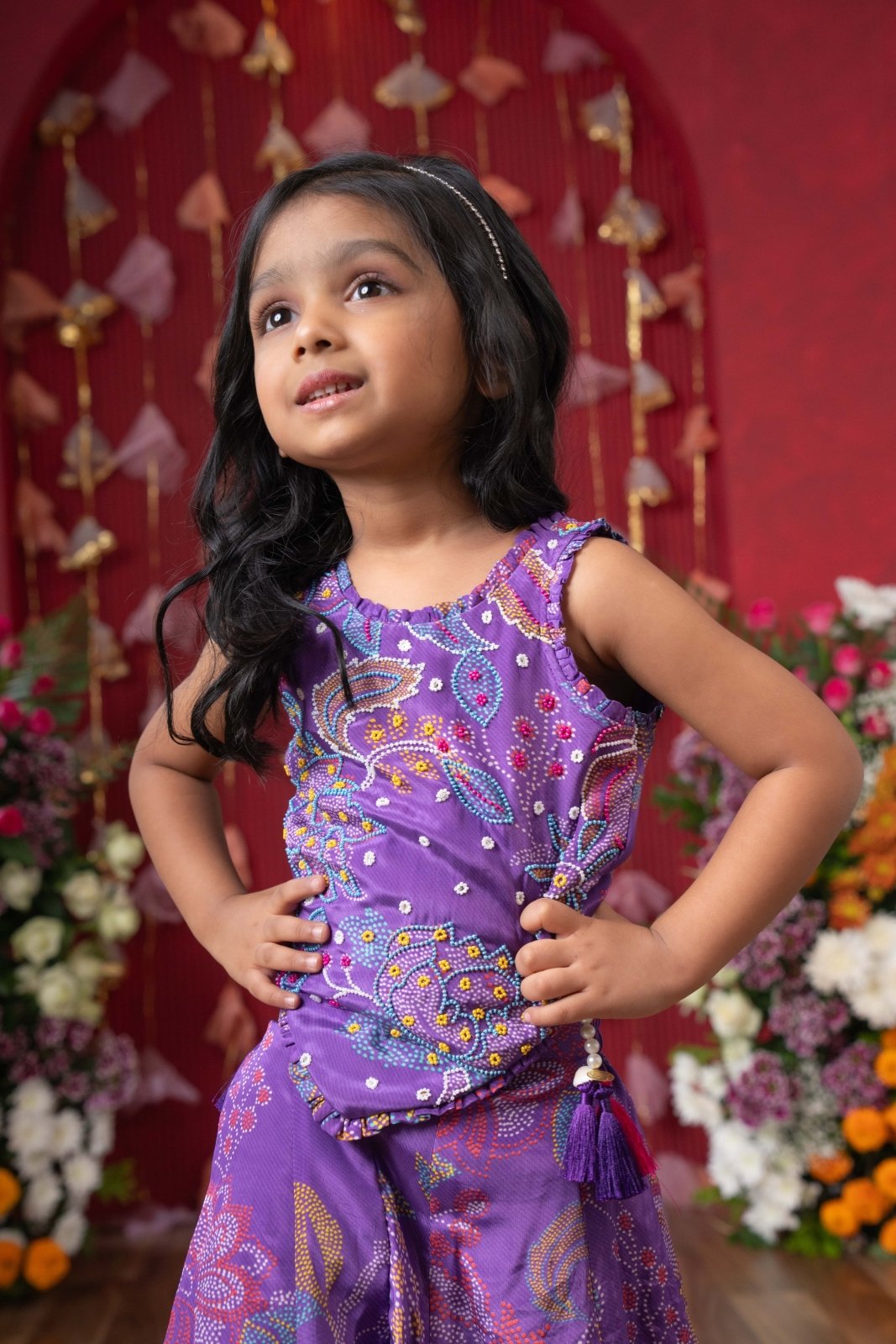 Add a pop of color to your celebrations with this vibrant purple printed top and flared palazzo set - Kirti Agarwal