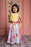 Add a pop of sunshine with this mustard crop top and floral paneled flared pants set for girls - Kirti Agarwal
