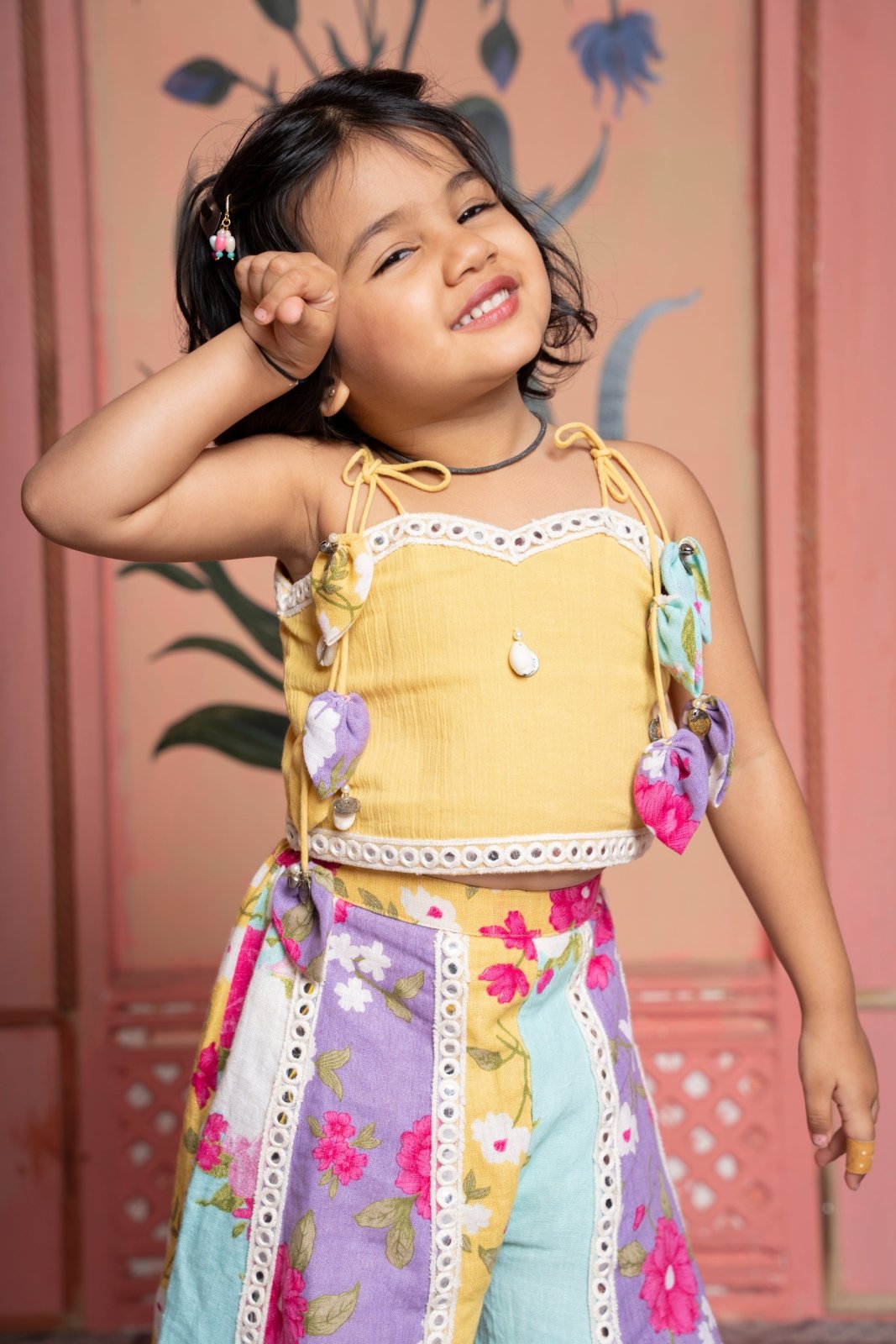Add a pop of sunshine with this mustard crop top and floral paneled flared pants set for girls - Kirti Agarwal