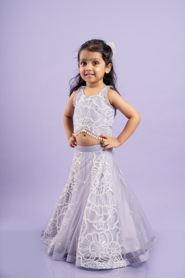 Adorable Lavender floral - embroidered lehenga set with a beaded crop top, perfect for a charming and elegant look at special occasions. - Kirti Agarwal