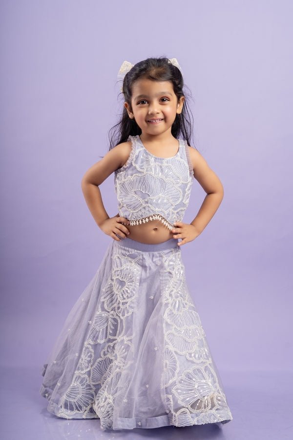 Adorable Lavender floral - embroidered lehenga set with a beaded crop top, perfect for a charming and elegant look at special occasions. - Kirti Agarwal